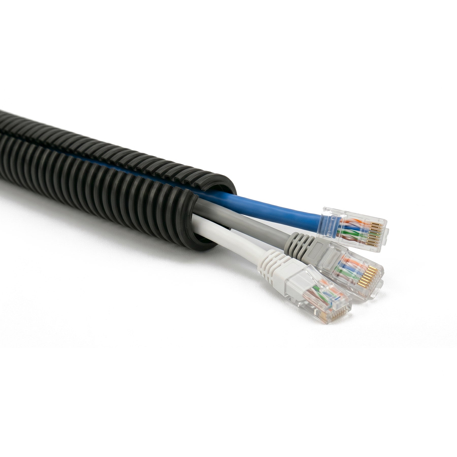 Flexible Split Polypropylene Conduit for Cable Protection (Closeup of Cables) by Cableties.co.uk